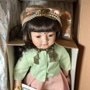 The Heirloom International Doll Collection Doll.